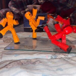 Vibrant Orange and Red Action Figures Playset